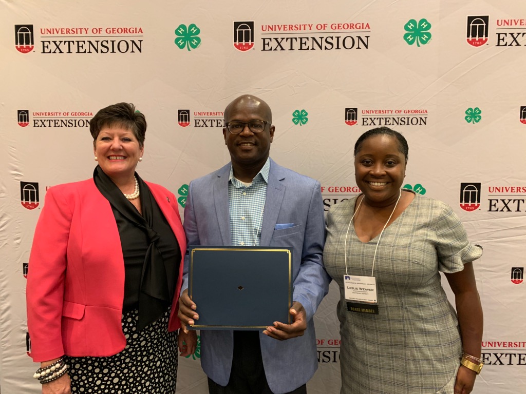 (From left) Dr. Laura Perry Johnson, associate dean for Extension at the University of Georgia, congratulates Phillip Petway, Fort Valley State University Extension 4-H agent for Twiggs County and former FVSU 4-H program assistant Leslie Weaver for their achievements at the 2019 Georgia Extension Association of Family and Consumer Sciences conference in Savannah.