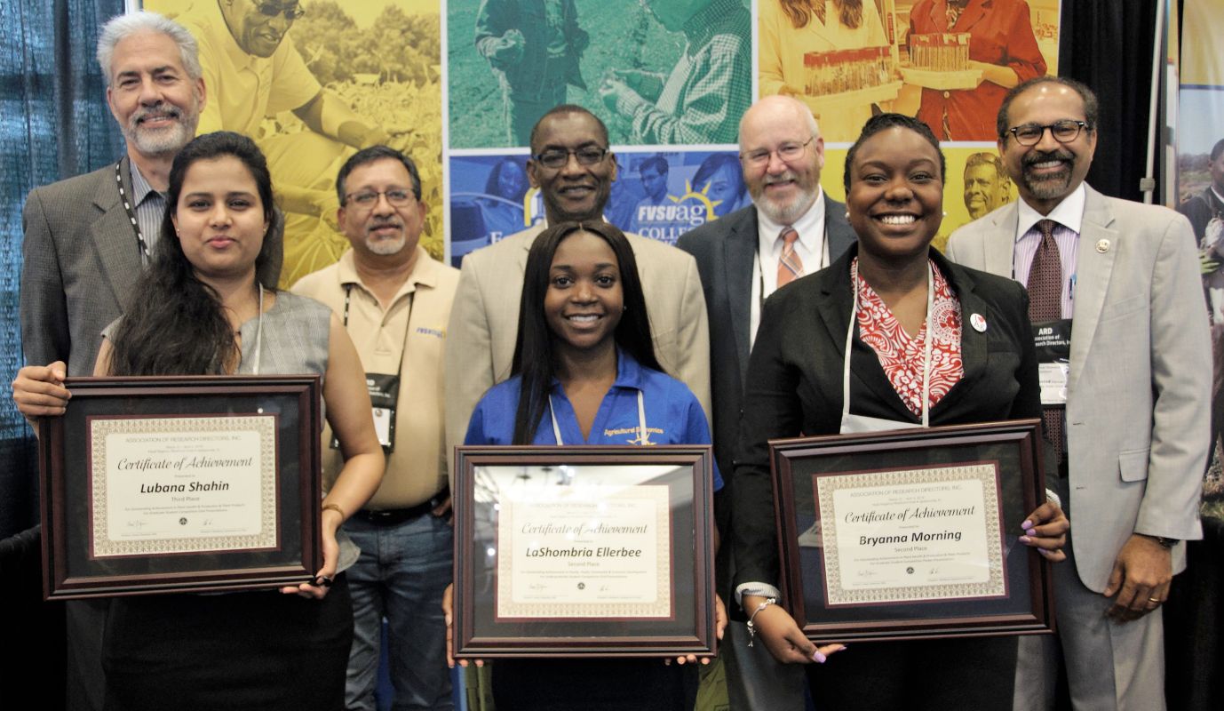 Pictured (from left, front row): Lubana Shahin, Master of Science in biotechnology major; LaShombria Ellerbee, senior agricultural economics major; and Breyanna Morning, Master of Science in animal science major. Pictured (from left, back row): Dr. Daniel Blankenship, interim dean for the College of Agriculture, Family Sciences and Technology; Dr. Nirmal Joshee, professor of plant science; Dr. Mohammed Ibrahim, coordinator and professor of the agricultural economics program; Dr. Thomas Terrill, associate professor of animal science; and Dr. Govind Kannan, associate dean for research.
