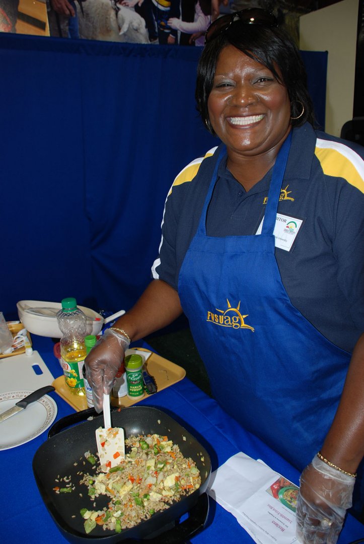 Gail Adams, recently retired Peach county extension agent, shown here conducting a healthy cooking demonstration at the Sunbelt Agricultural Exposition.