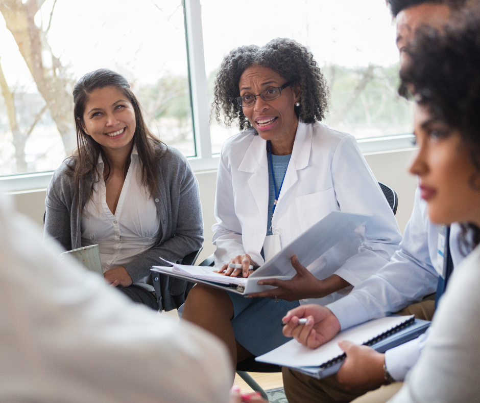 Two men standing in warehouse.