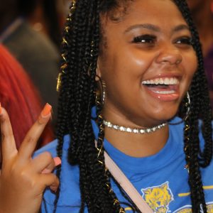 TIght shot of face of FVSU strudent smiling and laughing