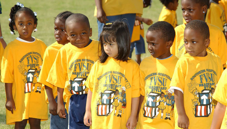 Class of children wearing yellow FVSU shirts