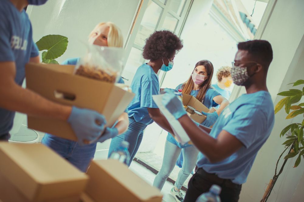 Volunteers packing donation boxes