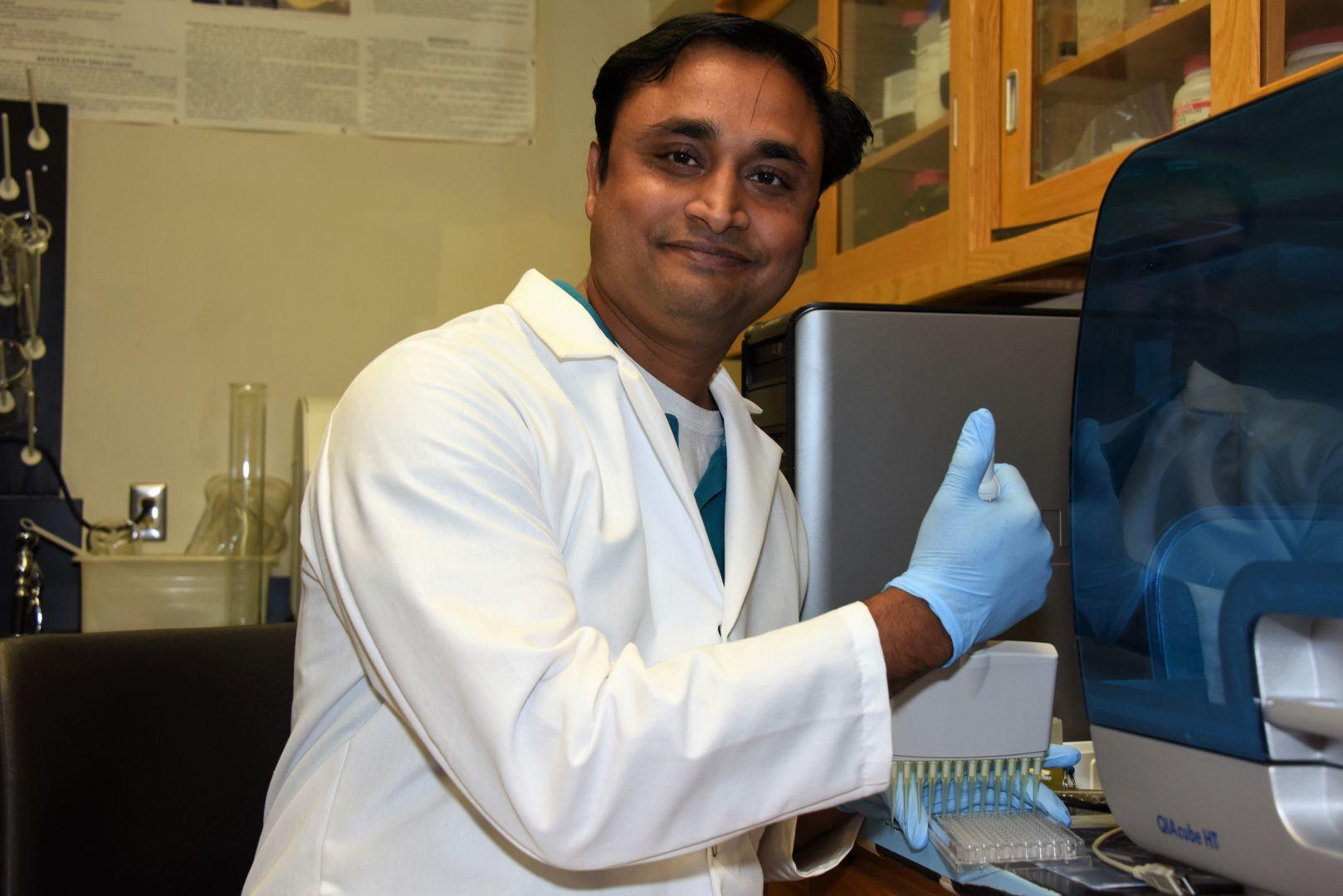 ort Valley State University research professional Dr. Somashekhar Punnuri busy at work in the laboratory.