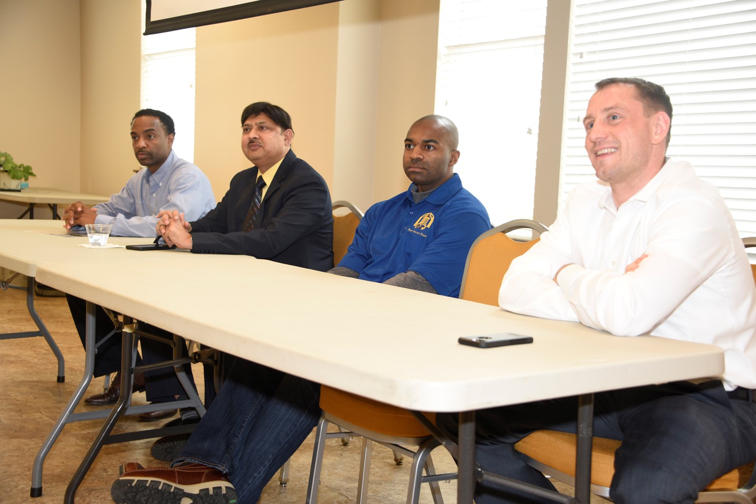 (From left to right) Dr. Cedric Ogden, FVSU assistant professor of agricultural engineering; Dr. Hari Singh, FVSU research professor and coordinator for the biotechnology program; Donald Bacoat, FVSU aquaculture and production assistant and Ned Van Allan,