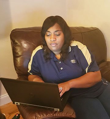 Millicent Price, Fort Valley State University Extension agent for Crawford County, is providing service to her clients by teleworking during the COVID-19 pandemic. 