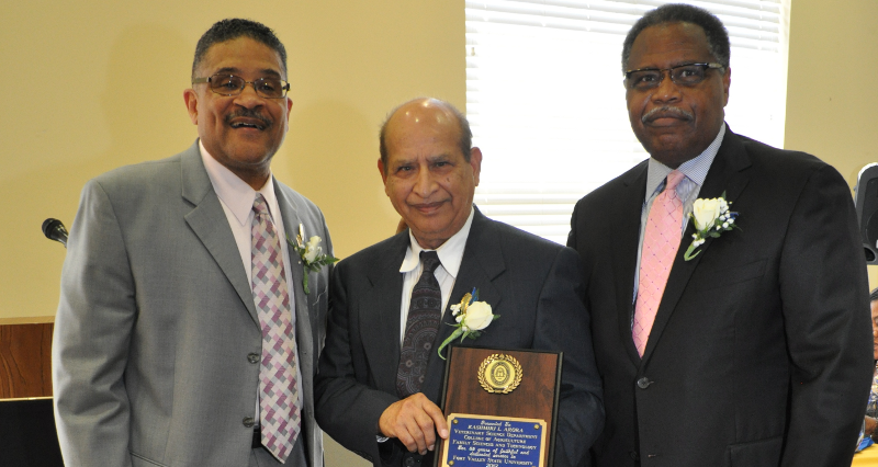 Dr. Kashmiri Arora poses with Fort Valley State University President Larry E. Rivers and Associate Vice President for Land Grant Institution, Mark Latimore, at the 2012 Retirement Banquet.