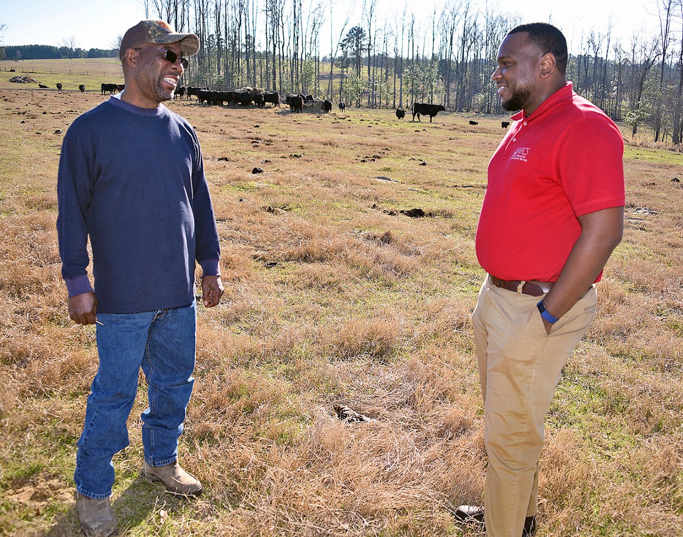 Jazmond Carter shares a moment with a client during a field visit.
