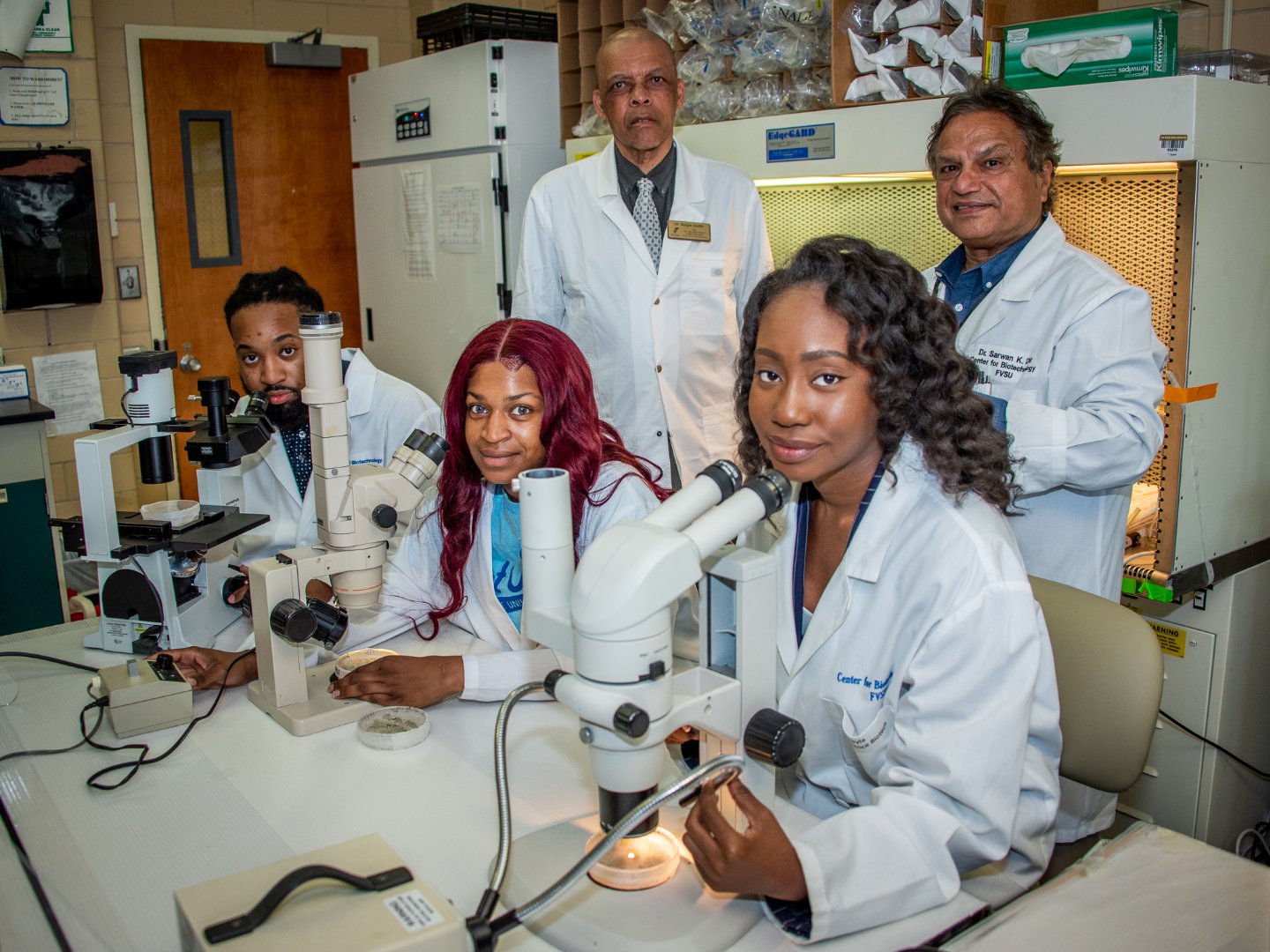 Fort Valley State University seniors Aikaari Ryce, Tori McGuire and Kayla Staten will soon start a new chapter in their lives. They are shown with Dr. Ralph Noble, dean of the College of Agriculture, Family Sciences and Technology, and plant science professor Dr. Sarwan Dhir.