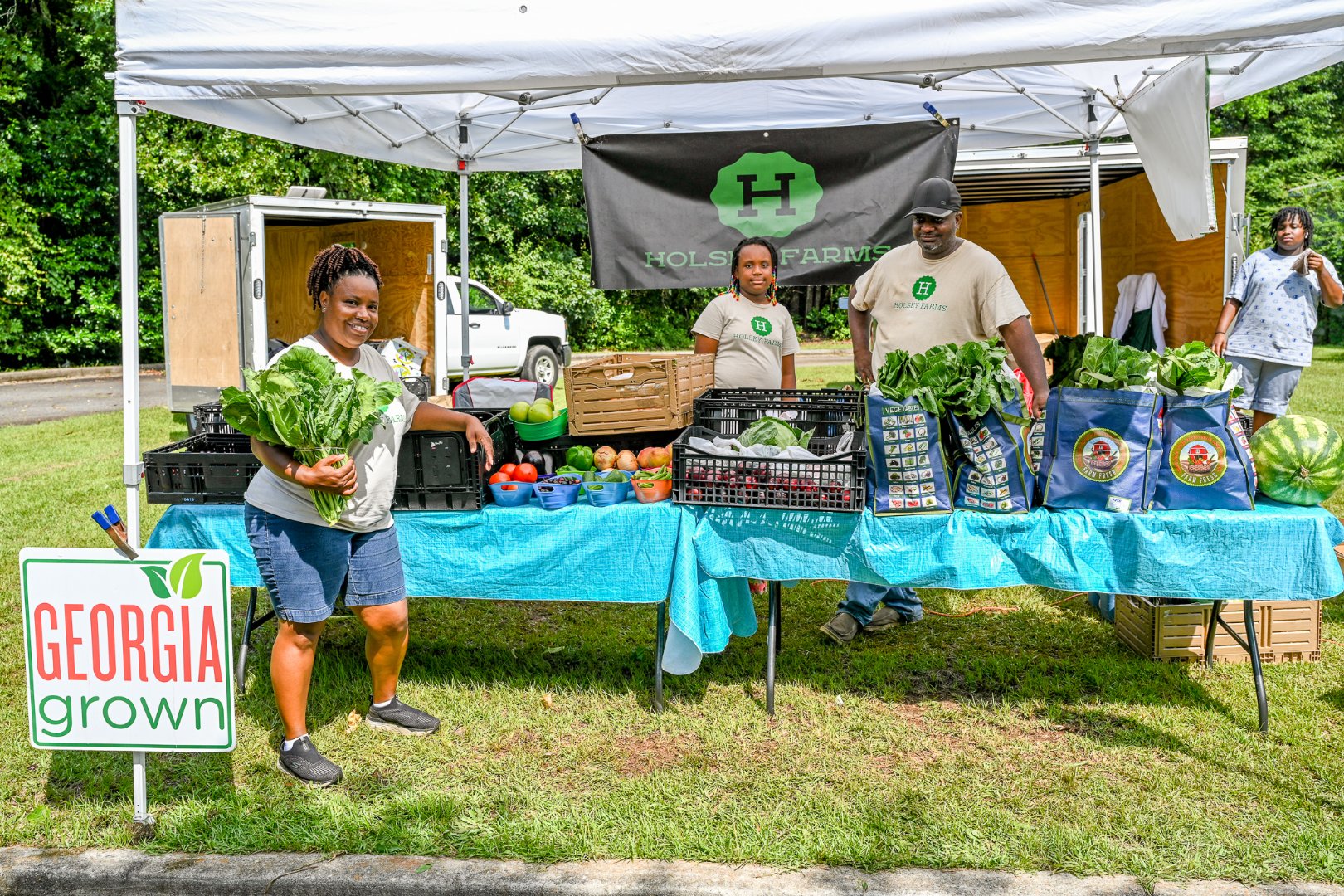 Fort Valley State University student Rodney “RJ” Brooks worked with Shon and Chiquita Holsey of Holsey Farms over the summer at several farmers markets, including in Peach County.