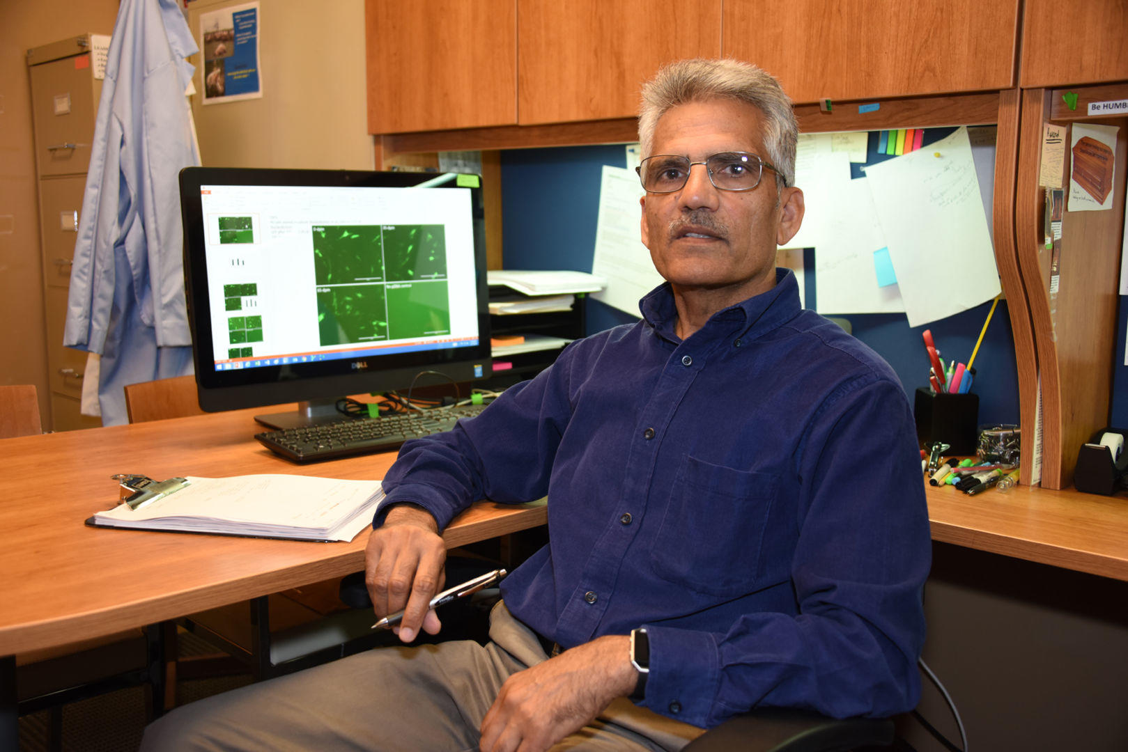 Dr. Mahipal Singh seated in his office in the Houston Stallworth building.