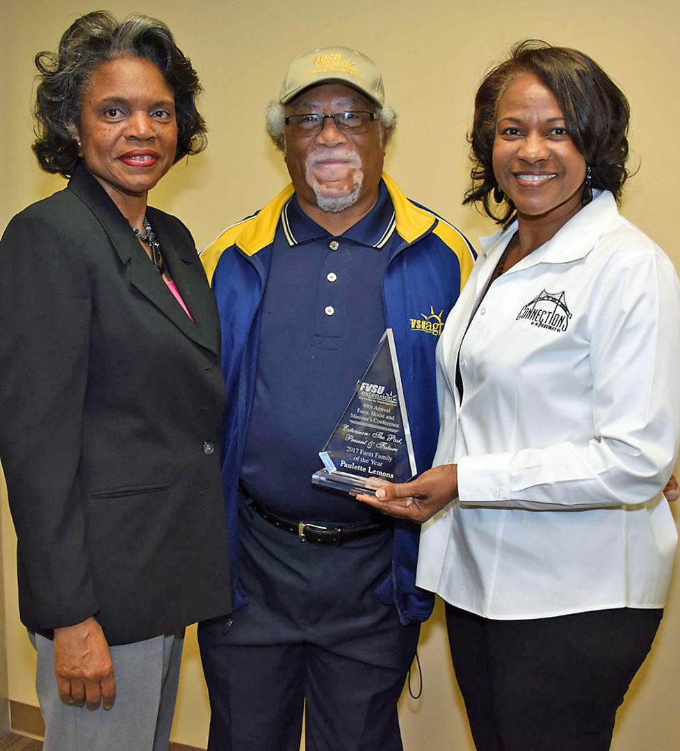 Leon Porter (center) FVSU’s Houston County program assistant, poses with 2017 Agriculture and Natural Resources Farm Family of the Year Awardees Marsha Moore (left) and Paulette Lemons of Connections on the Parkway at FVSU’s Pettigrew Center Feb. 21.
