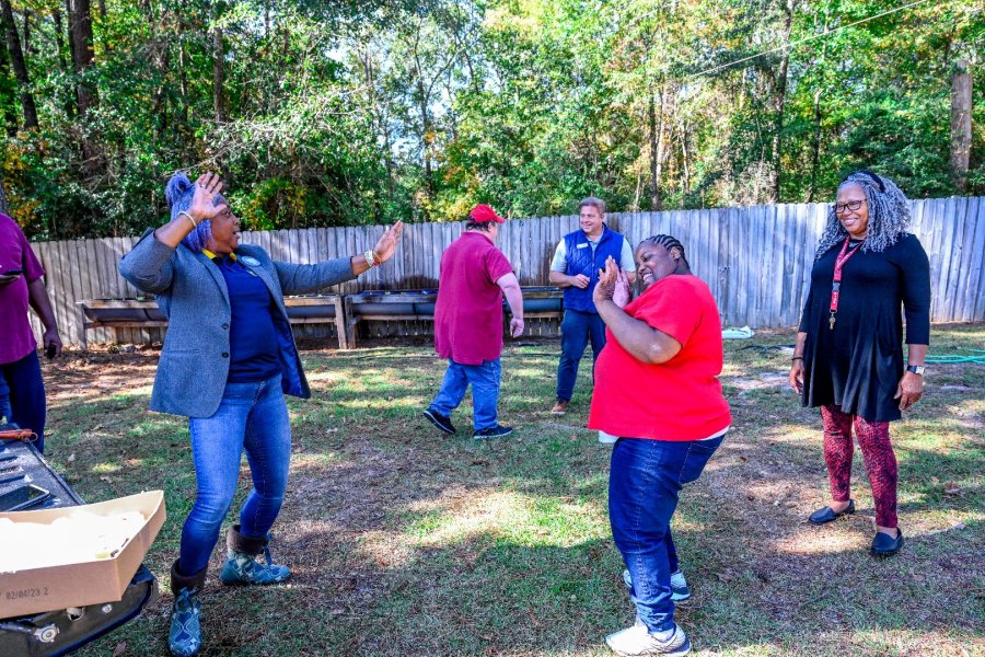 Chaney dances with a Twiggs County resident who joins in the fun.