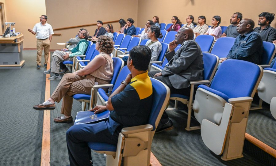 Dr. Basavaprabhu Patil, Fulbright fellow from the University of California, Davis, explains his research efforts to Fort Valley State University students and faculty.