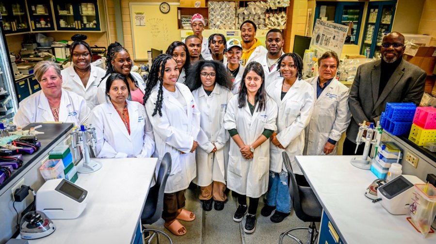 Fort Valley State University students are shown in the plant science laboratory with Dr. Keith Howard, dean of the College of Agriculture, Family Sciences and Technology, and Dr. Sarwan Dhir, professor of plant biotechnology.