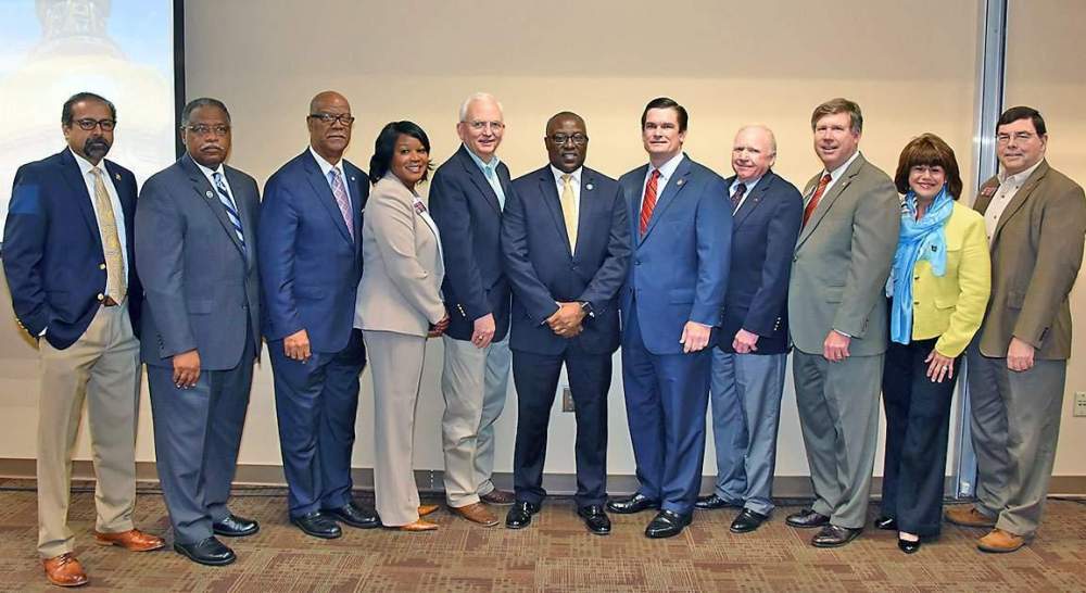 Fort Valley State University president Dr. Paul Jones (center) along with Dr. Govind Kannan, dean of FVSU’s College of Agriculture, Family Sciences and Technology (far left) and Mark Latimore Jr., FVSU Extension administrator (second to the left) pose with Georgia elected officials on April 12 in the Pettigrew Center for the 35th annual Ham and Egg Legislative Breakfast.