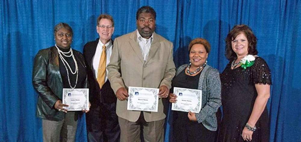 NEAFCS Award (From Left to Right) Terralon Chaney, FVSU Twiggs County extension agent; Mike Vogel, Montana State University housing specialist; Marc Thomas, FVSU director of field operations; Keishon Thomas, FVSU housing specialist; and Amy Peterson, president of NEAFCS.