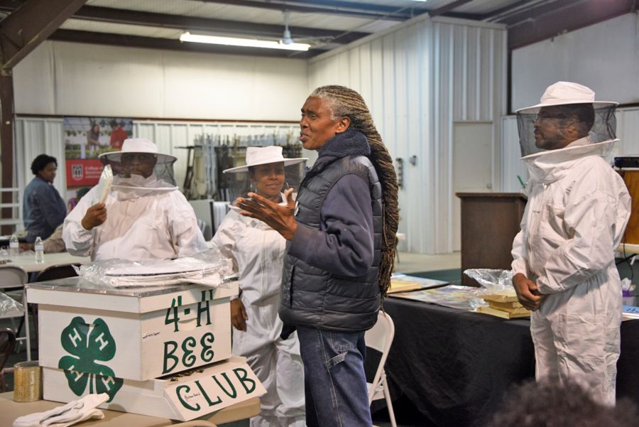 Sam X, manager of the Village Community Garden in Sylvester, explains methods of beekeeping during the Small Farmers Training Conference at the Worth County Agricultural Pavilion on Jan. 11.