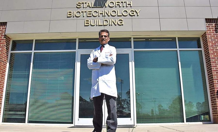 Dr. Mahipal Singh, an associate professor of animal biotechnology at Fort Valley State University, stands in front of the Stallworth biotechnology building.