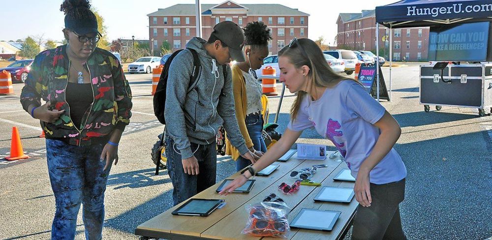 FVSU Students learning with HungerU mobile education exhibit