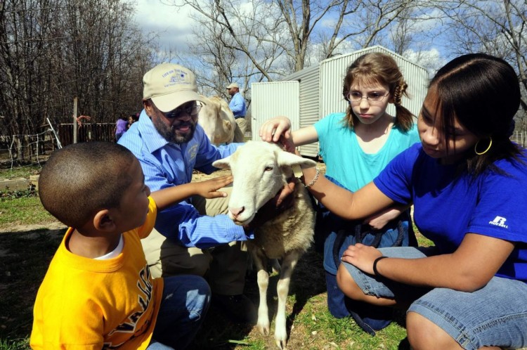 Children with animal.