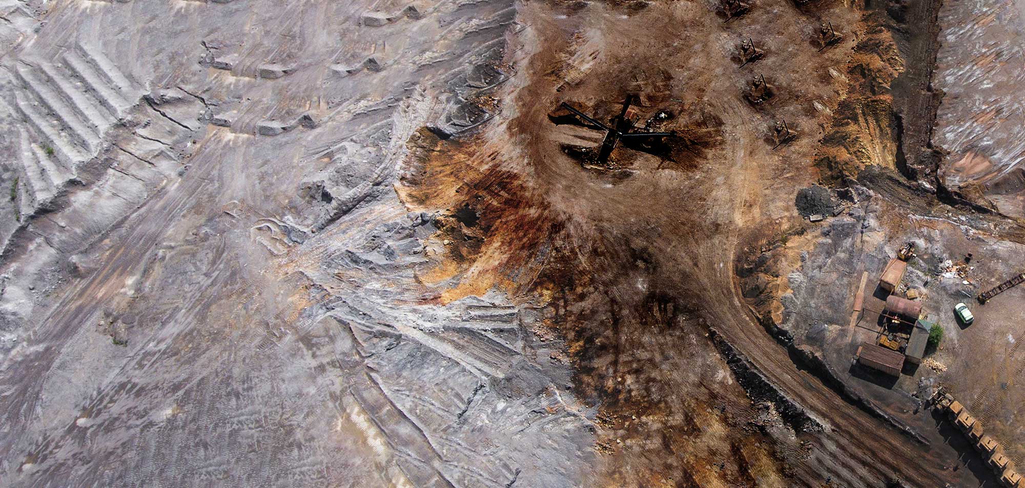 aerial view showing effects of erosion around industrial mine