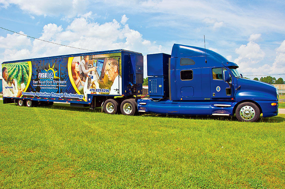 Right side view of Mobile Information Technology Center truck.